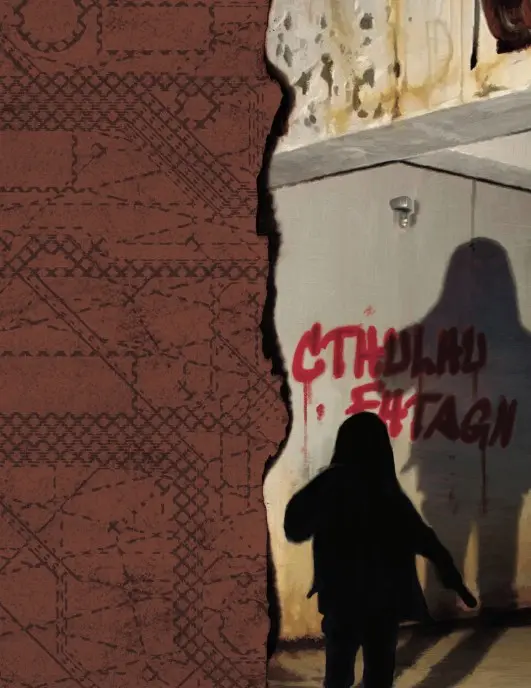 Przykładowa strona z grafiką z podręcznika Black Sites  przedstawiająca napis na murze 